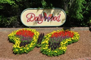 The Dollywood sign and butterfly flower arrangement at the entrance to the park.