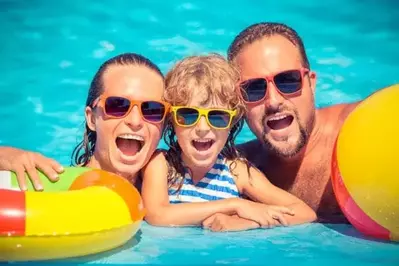 Family in pool at Pigeon Forge vacation rental condo