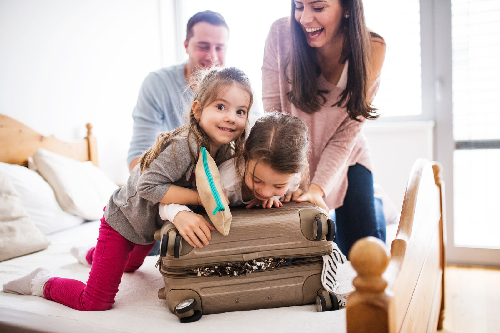 family with suitcase